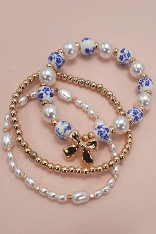 Blue Willow Gold Bow Pearl Bracelet Set