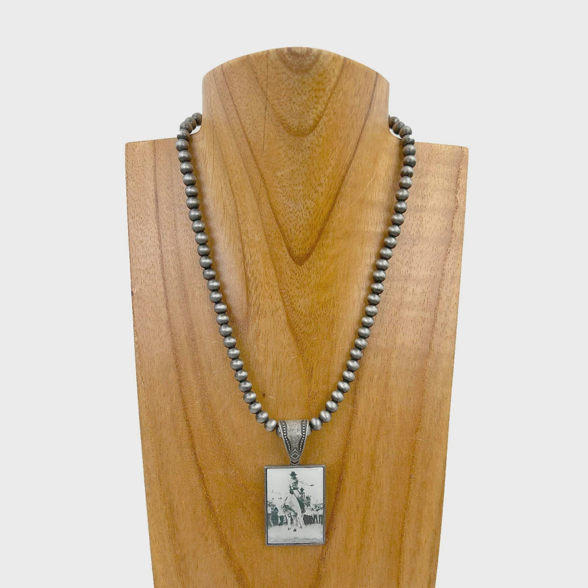 Silver Beaded Necklace With Rodeo Pendant