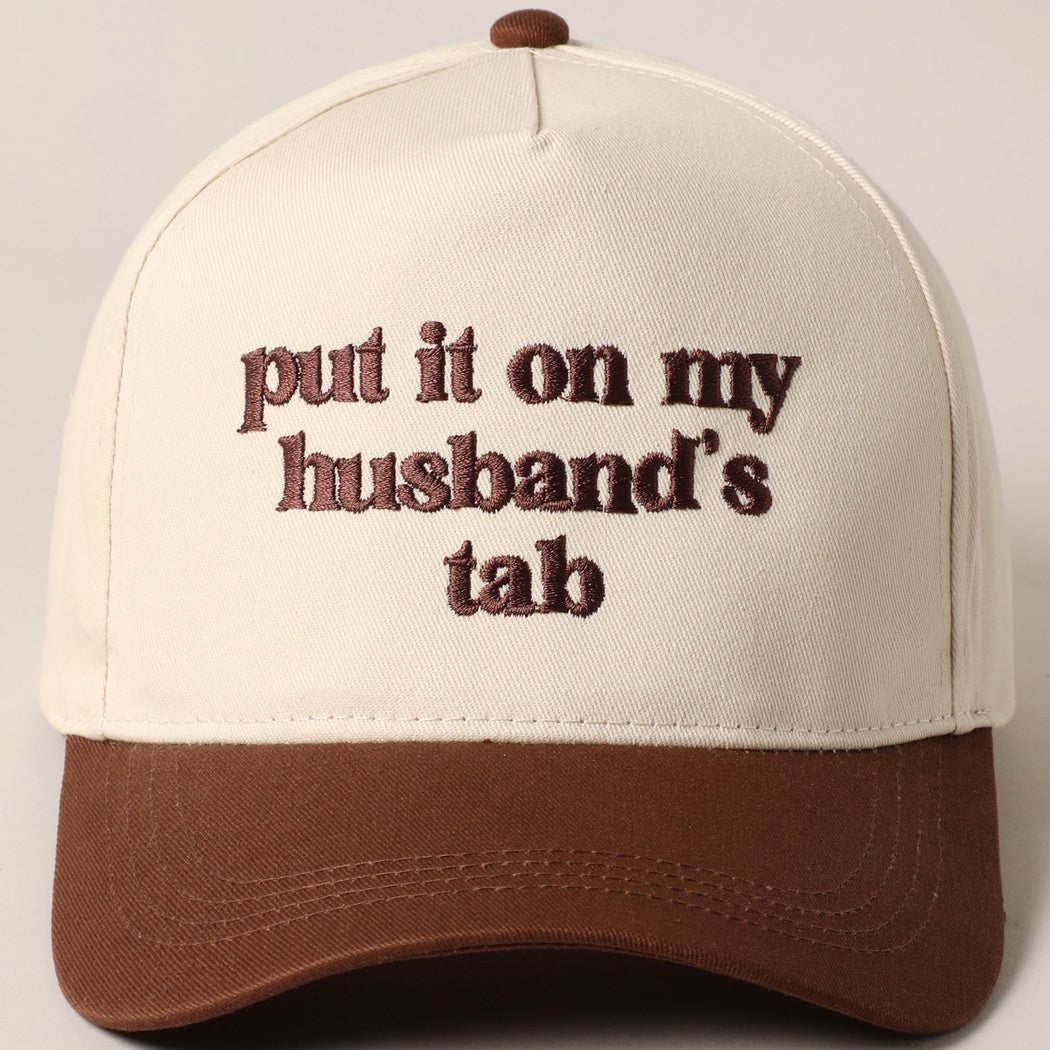 Put It On My Husband's Tab Brown Embroidered Trucker Hat