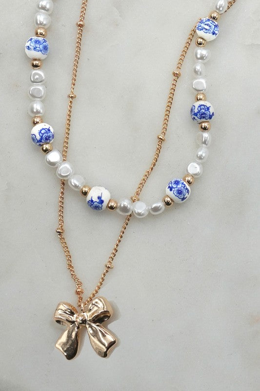 Blue Willow Gold Bow Pearl Necklace