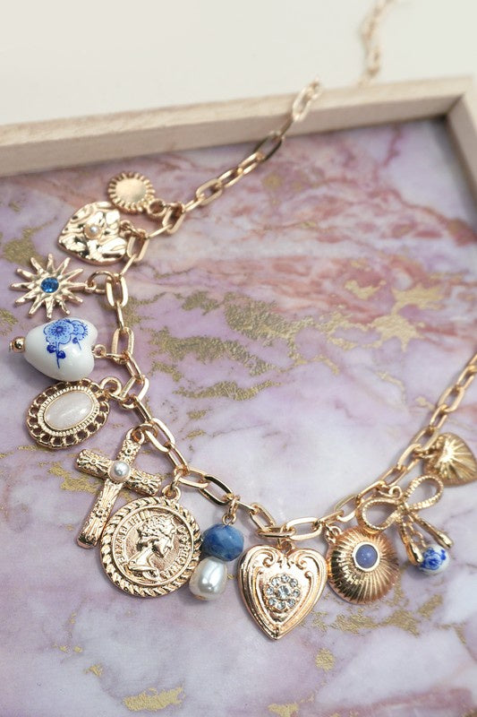 Blue Willow Gold Charm Cross Necklace