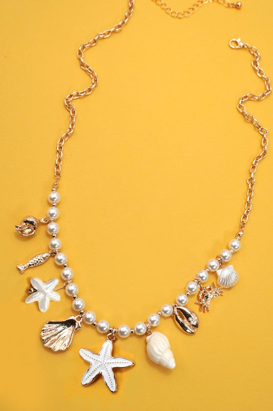 Gold Sea Shell Charm Necklace