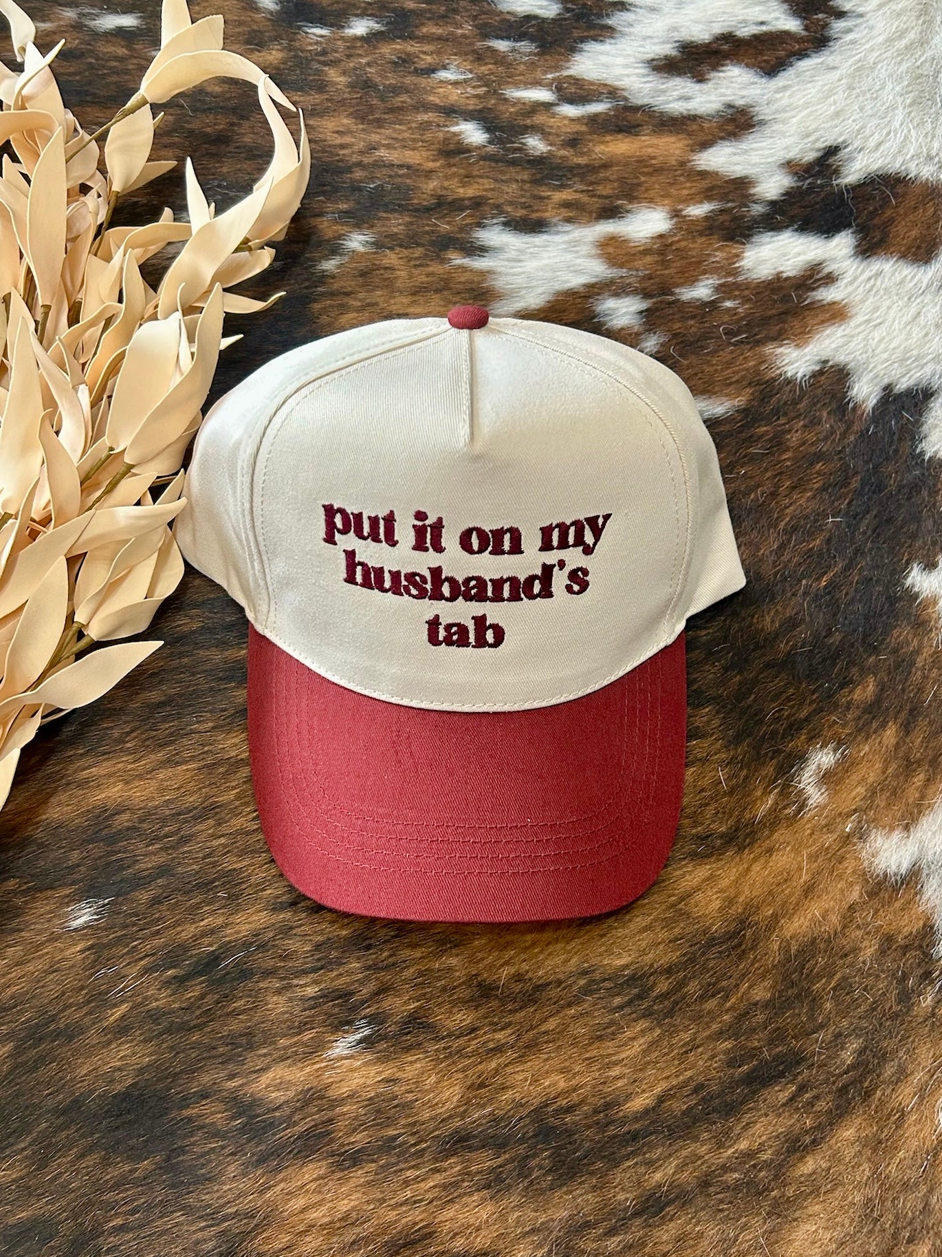 Put It On My Husbands Tab Burgundy Trucker Hat