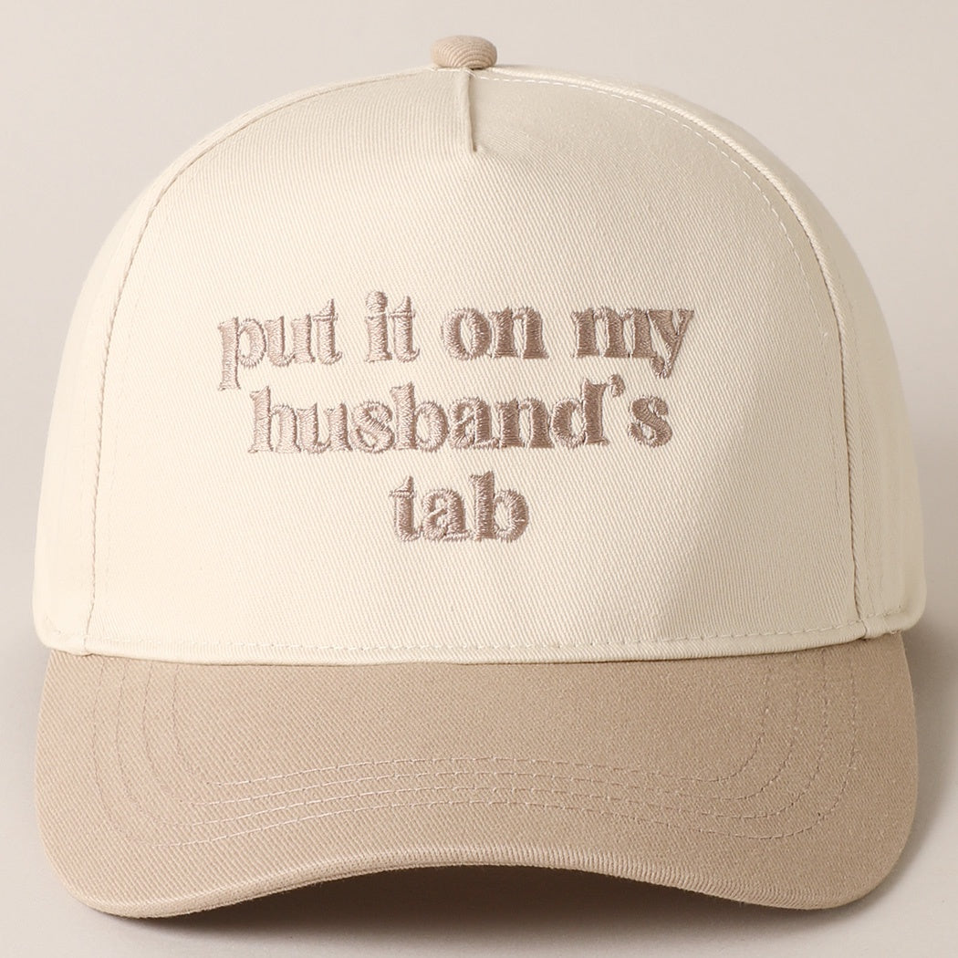 Put It On My Husband's Tab Beige Embroidered Trucker Hat